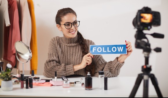 Content creator filming a social media video